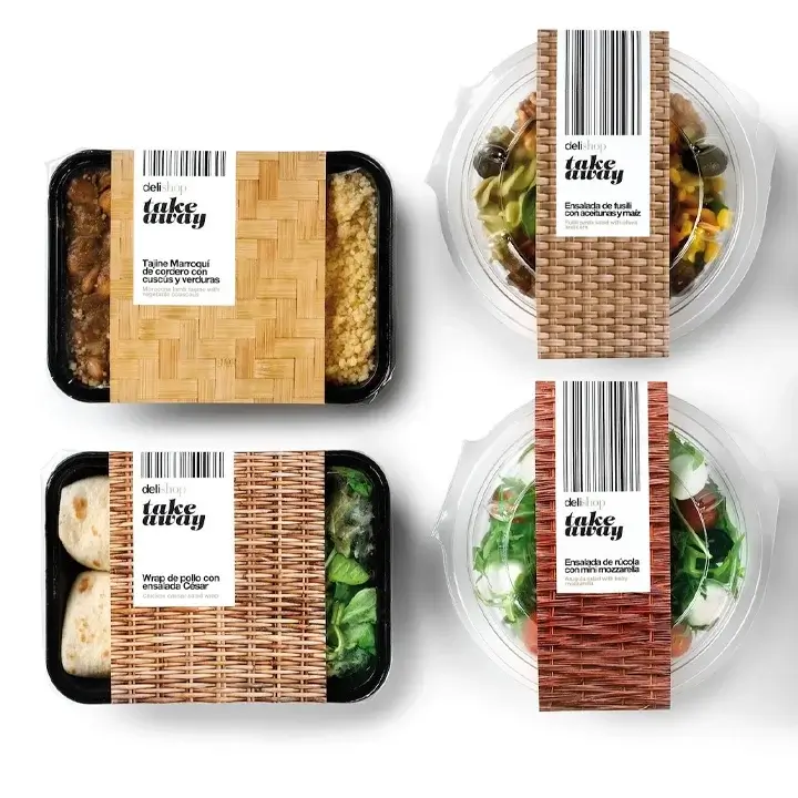Moisture-resistant packaging sleeves for frozen meal prep containers